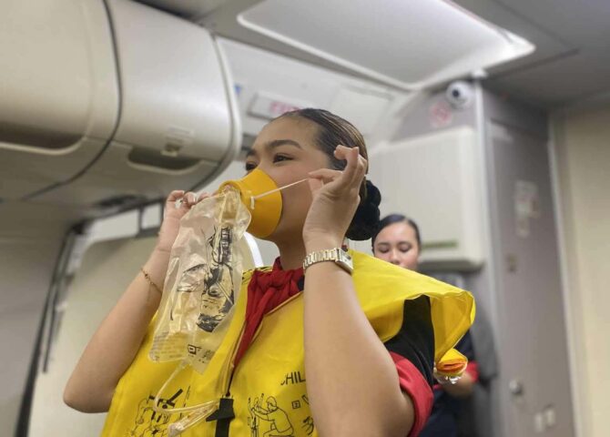 Flight attendant safety demo
